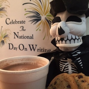 Dooley celebrates the National Day on Writing with cocoa and cookies.